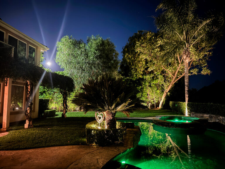 Backyard with pool, spa, and professional landscaping overlooking the Santa Monica mountains and Preserve.